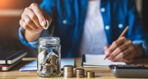 Budgeting to save money while also paying off debt.